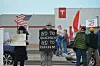 Tesla protest draws crowd