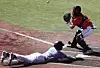Elzy slides home in fifth