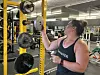 Michelle Johnston loads weights