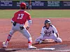 Ryan-Casados-dives-back-to-first-base-in-3rd_online
