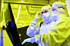 Manufacturing technicians work in the clean room of Intel's new Fab 9 in Rio Rancho, New Mexico, in January 2024. (Credit: Intel Corporation)